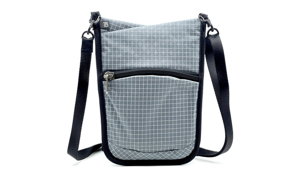 The front of the P.I.K.A. Pouch in Northwest Sky (light grey with white gridding) 200 Halcyon.